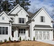 Farmhouse style Home with painted brick built by Atlanta Homebuilder Waterford Homes in Brookhaven